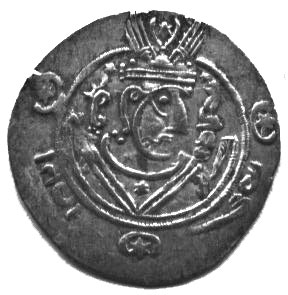black and white photo of a coin with a man's head on it