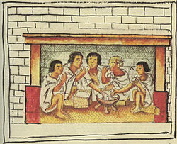 Aztec men sharing a meal