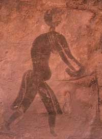 Using a grindstone (Tassili n'Ajjer, Algeria, ca. 7000 BC)