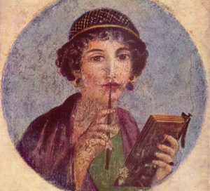 A woman from Roman Egypt, holding a notebook and a pen